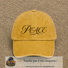 Image principale produit132moyenJ - casquette Jaune délavé - Moutarde délavé avec visuel Peace calligraphie 5 cm